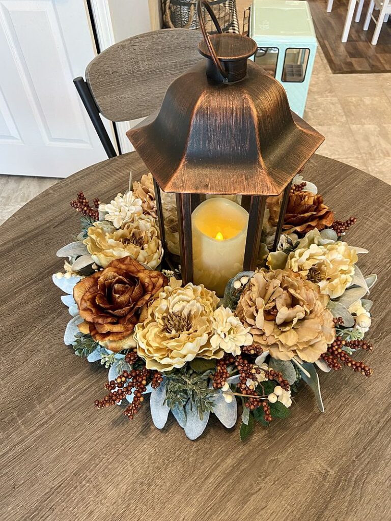 candle centerpiece with fall flowers