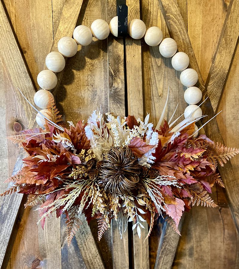 wooden ball wreath with fall foilage