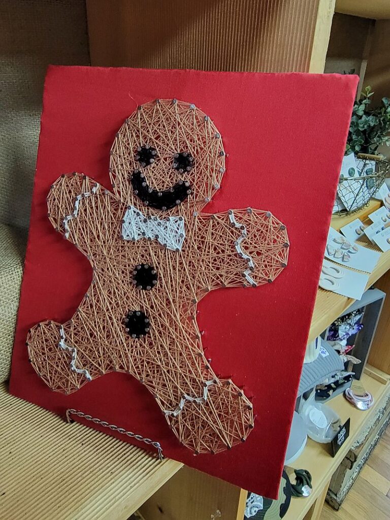 red background gingerbread string art