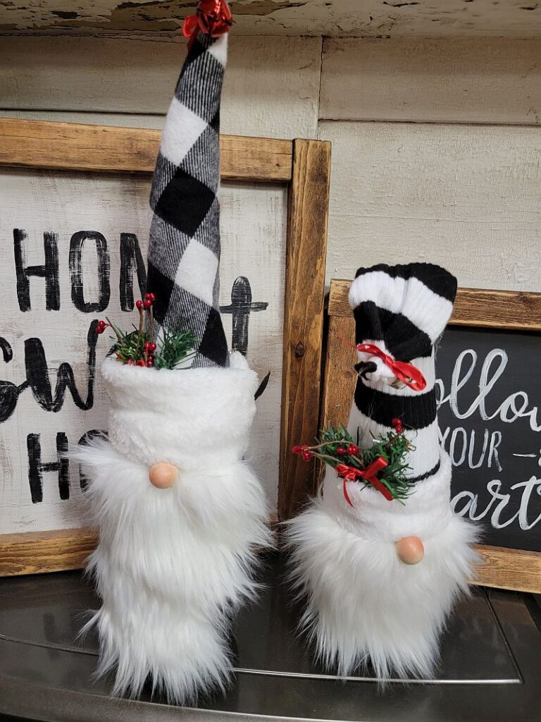 holiday gnome decorations with black checkered hats